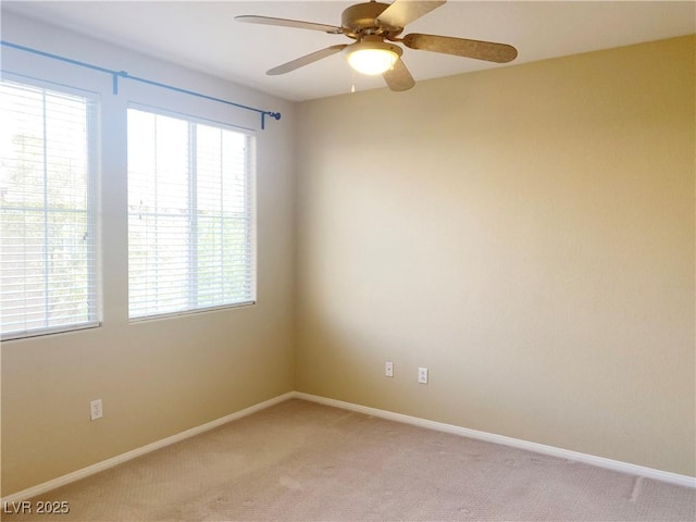 10190 Deerfield Beach Ave Unit 202, Las Vegas, NV 89129 - unfurnished room with a ceiling fan, light carpet, and baseboards
