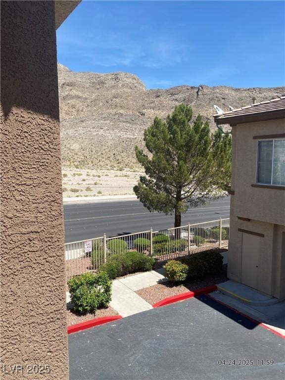 10190 Deerfield Beach Ave Unit 202, Las Vegas, NV 89129 - view of patio featuring a mountain view