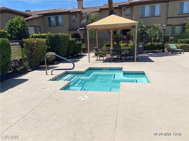 10190 Deerfield Beach Ave Unit 202, Las Vegas, NV 89129 - view of swimming pool with a patio area, a gazebo, and a pool