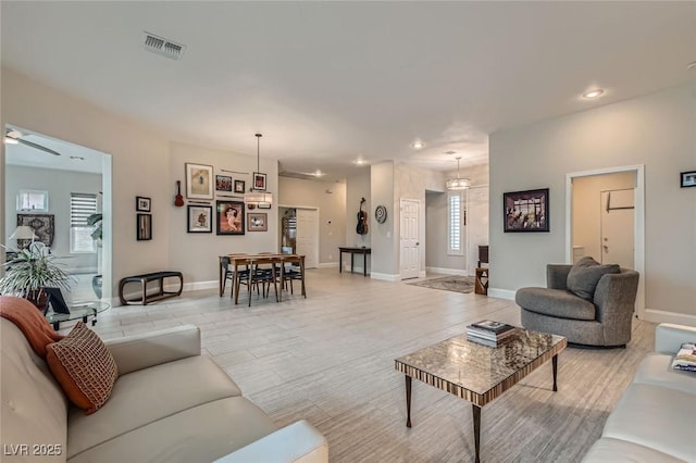 1314 Doggett Ave, Las Vegas, NV 89123 - living area featuring ceiling fan, recessed lighting, plenty of natural light, and baseboards