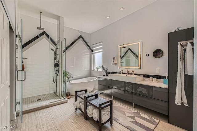1314 Doggett Ave, Las Vegas, NV 89123 - full bath featuring vanity, a shower stall, and a freestanding tub