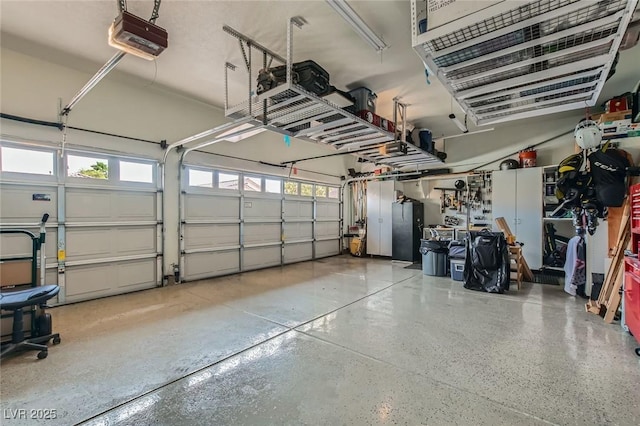 1314 Doggett Ave, Las Vegas, NV 89123 - garage with a garage door opener and freestanding refrigerator