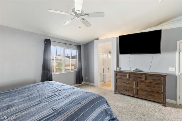 4878 Califa Dr, Las Vegas, NV 89122 - bedroom featuring lofted ceiling, light colored carpet, baseboards, ensuite bathroom, and ceiling fan