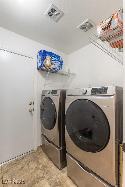 4878 Califa Dr, Las Vegas, NV 89122 - laundry area with washing machine and clothes dryer