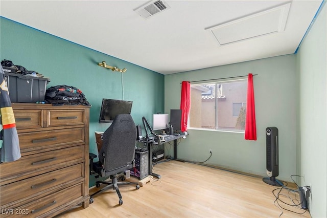 4878 Califa Dr, Las Vegas, NV 89122 - home office with wood finished floors and attic access