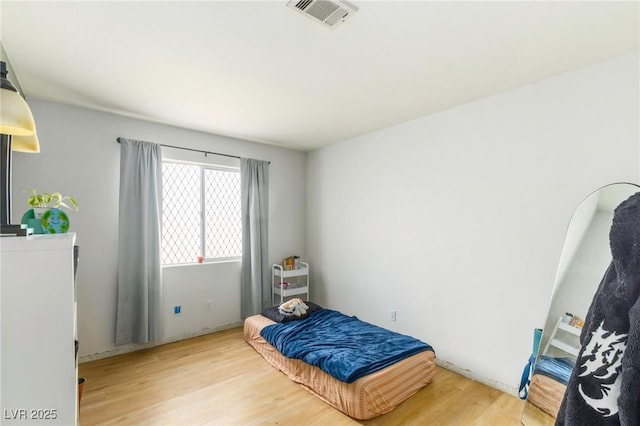 4878 Califa Dr, Las Vegas, NV 89122 - bedroom featuring light wood finished floors