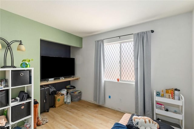 4878 Califa Dr, Las Vegas, NV 89122 - recreation room with wood finished floors