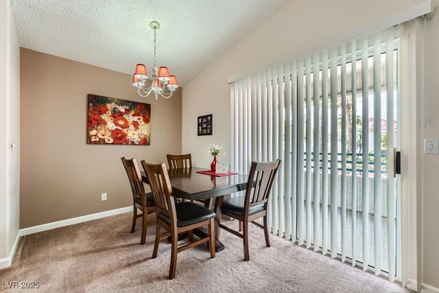 605 Devonhall St Unit 201, Las Vegas, NV 89145 - dining area with vaulted ceiling, carpet, a chandelier, baseboards, and a textured ceiling