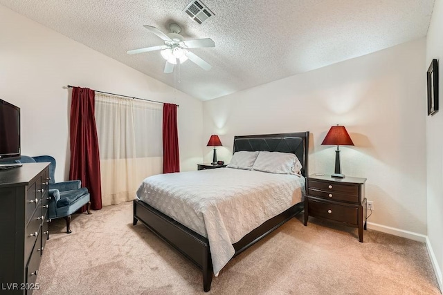 605 Devonhall St Unit 201, Las Vegas, NV 89145 - bedroom featuring light carpet, a textured ceiling, vaulted ceiling, baseboards, and a ceiling fan