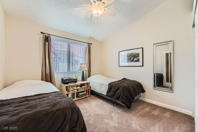 605 Devonhall St Unit 201, Las Vegas, NV 89145 - bedroom featuring a textured ceiling, carpet, lofted ceiling, ceiling fan, and baseboards