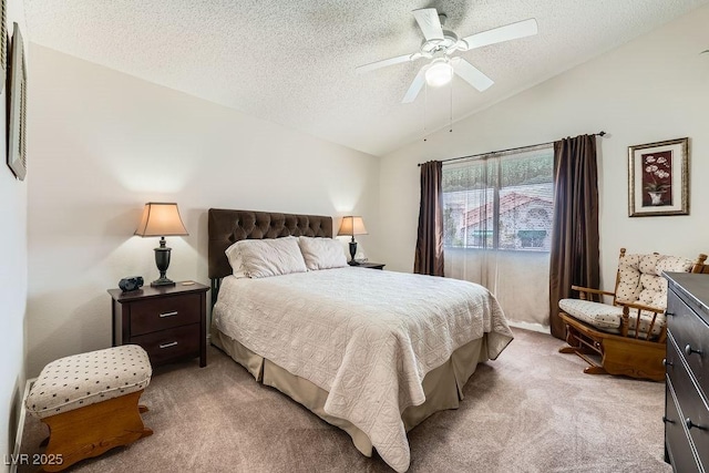 605 Devonhall St Unit 201, Las Vegas, NV 89145 - carpeted bedroom with vaulted ceiling, a textured ceiling, and ceiling fan