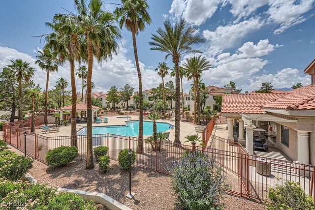 605 Devonhall St Unit 201, Las Vegas, NV 89145 - community pool featuring a gazebo, a patio area, and a residential view