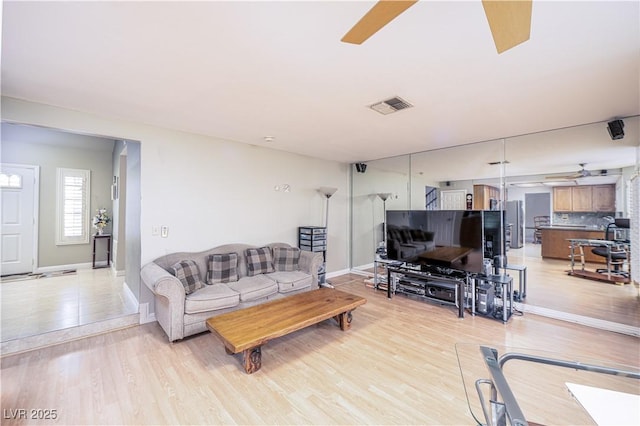 9021 Feather River Ct, Las Vegas, NV 89117 - living room with light wood-type flooring and a ceiling fan