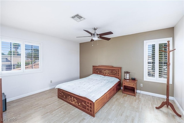 9021 Feather River Ct, Las Vegas, NV 89117 - bedroom with light wood-style floors and ceiling fan