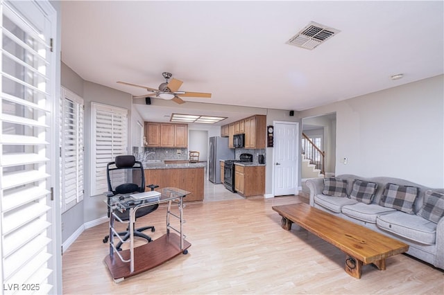 9021 Feather River Ct, Las Vegas, NV 89117 - living area featuring ceiling fan and light wood-type flooring