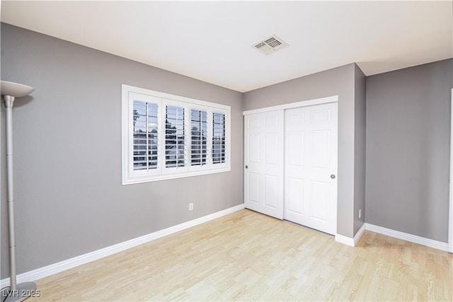 9021 Feather River Ct, Las Vegas, NV 89117 - unfurnished bedroom featuring wood finished floors and a closet