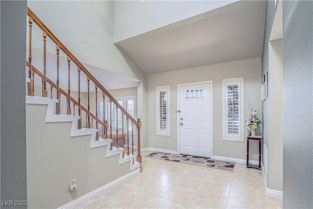 9021 Feather River Ct, Las Vegas, NV 89117 - tiled entrance foyer with stairway and lofted ceiling