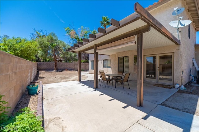 9021 Feather River Ct, Las Vegas, NV 89117 - fenced backyard with a patio and outdoor dining area