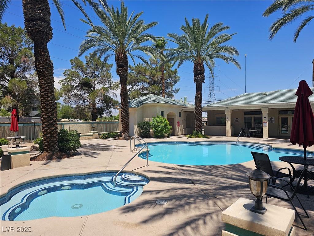 5155 W Tropicana Ave Unit 2140, Las Vegas, NV 89103 - community pool with a patio area