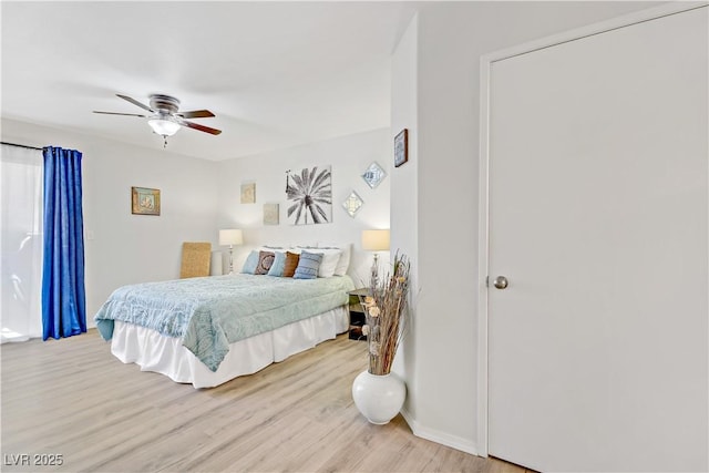 698 S Racetrack Rd Unit 1714, Henderson, NV 89015 - bedroom featuring light wood-style flooring, baseboards, and ceiling fan