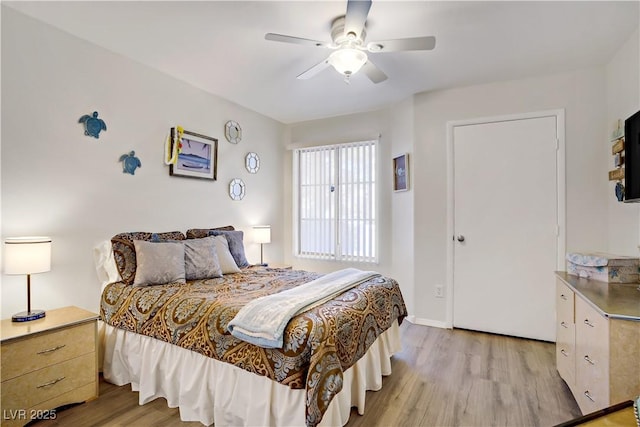 698 S Racetrack Rd Unit 1714, Henderson, NV 89015 - bedroom featuring light wood-style flooring and a ceiling fan