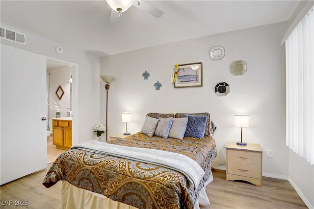 698 S Racetrack Rd Unit 1714, Henderson, NV 89015 - bedroom featuring light wood-type flooring, connected bathroom, a ceiling fan, and baseboards
