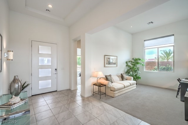 6728 Regency Ridge Ct, Las Vegas, NV 89148 - living area with baseboards, light carpet, light tile patterned flooring, and recessed lighting