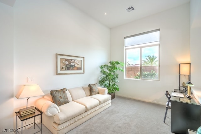6728 Regency Ridge Ct, Las Vegas, NV 89148 - living room featuring baseboards and carpet floors