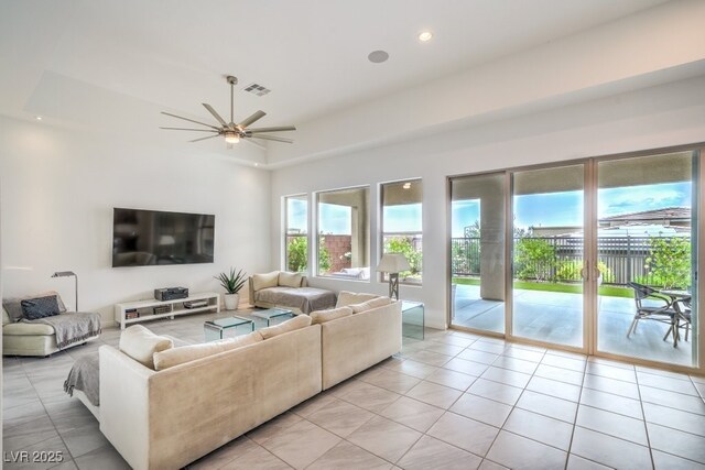 6728 Regency Ridge Ct, Las Vegas, NV 89148 - living room featuring light tile patterned floors, ceiling fan, and recessed lighting
