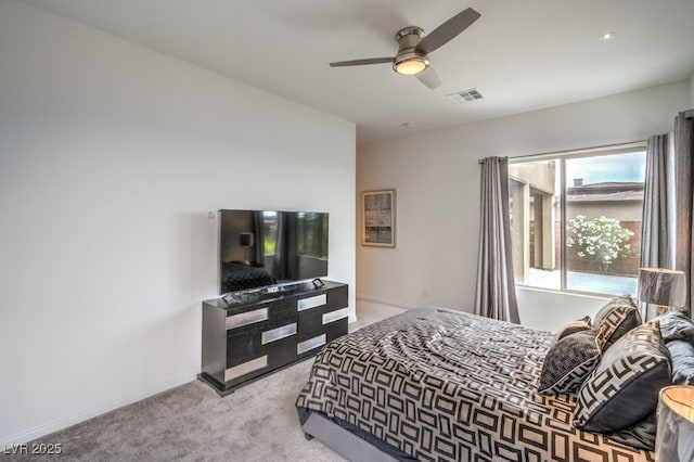 6728 Regency Ridge Ct, Las Vegas, NV 89148 - carpeted bedroom with multiple windows, baseboards, and a ceiling fan