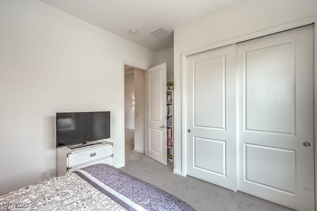 6728 Regency Ridge Ct, Las Vegas, NV 89148 - bedroom featuring light colored carpet and a closet