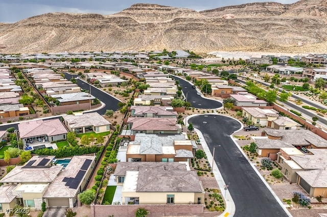 6728 Regency Ridge Ct, Las Vegas, NV 89148 - aerial view of residential area featuring a mountainous background