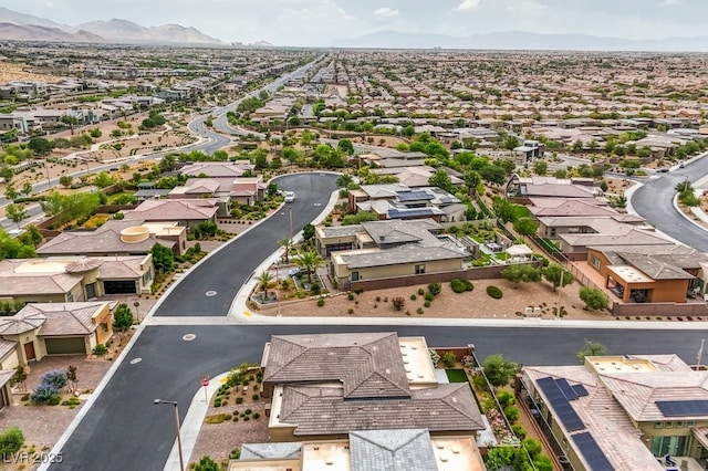 6728 Regency Ridge Ct, Las Vegas, NV 89148 - aerial perspective of suburban area with a mountain backdrop