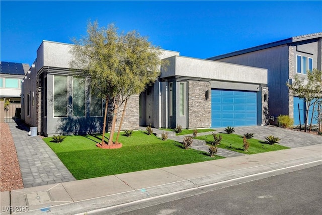 7208 Grace Estate Ave, Las Vegas, NV 89113 - contemporary house with an attached garage, a front lawn, driveway, and stone siding