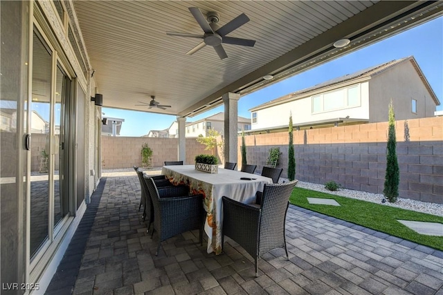 7208 Grace Estate Ave, Las Vegas, NV 89113 - fenced backyard featuring a ceiling fan and a patio