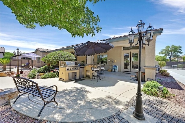 7408 Via Fiorentino St, Las Vegas, NV 89131 - view of patio featuring area for grilling and french doors