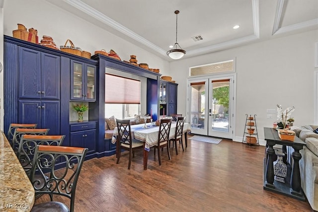 7408 Via Fiorentino St, Las Vegas, NV 89131 - dining room with french doors, dark wood finished floors, plenty of natural light, ornamental molding, and recessed lighting