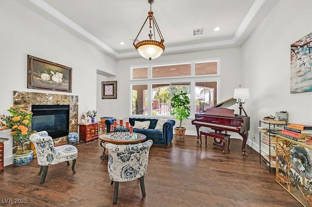 7408 Via Fiorentino St, Las Vegas, NV 89131 - living room featuring wood finished floors, a high end fireplace, ornamental molding, recessed lighting, and a towering ceiling