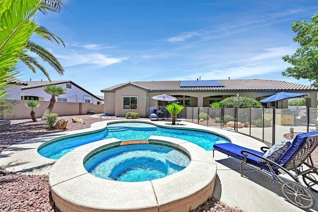 7408 Via Fiorentino St, Las Vegas, NV 89131 - view of swimming pool with a patio, a fenced backyard, and a pool with connected hot tub