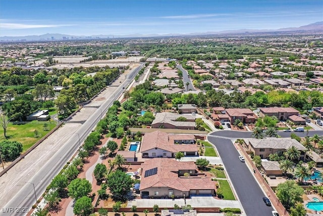 7408 Via Fiorentino St, Las Vegas, NV 89131 - aerial perspective of suburban area featuring a mountain backdrop