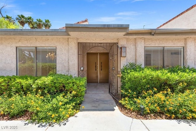2480 Domingo St, Las Vegas, NV 89121 - entrance to property featuring stucco siding