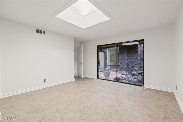 2480 Domingo St, Las Vegas, NV 89121 - empty room with baseboards and a skylight