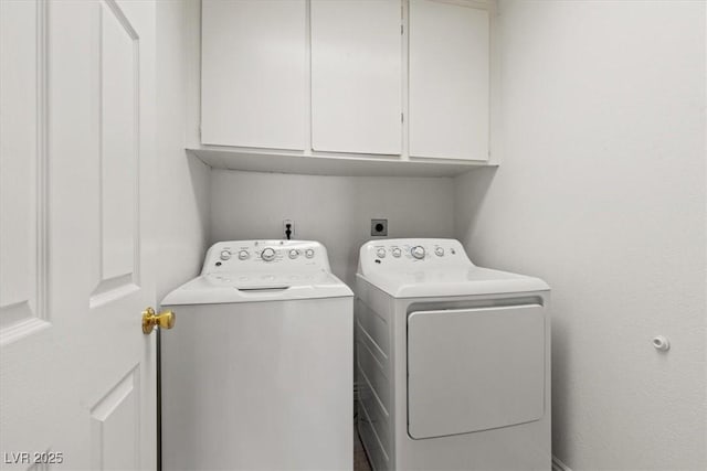 2480 Domingo St, Las Vegas, NV 89121 - laundry area featuring cabinet space and independent washer and dryer