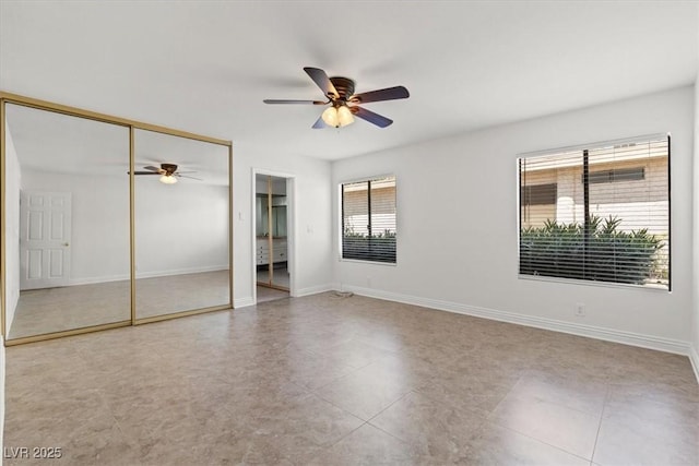 2480 Domingo St, Las Vegas, NV 89121 - unfurnished bedroom featuring baseboards, a ceiling fan, and a closet