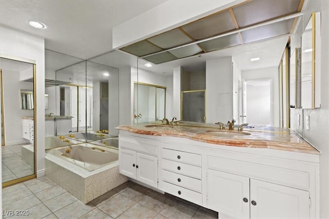 2480 Domingo St, Las Vegas, NV 89121 - bathroom featuring a bath, double vanity, tile patterned floors, a shower, and recessed lighting