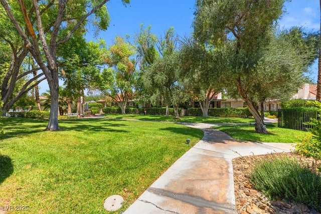2480 Domingo St, Las Vegas, NV 89121 - view of home's community with a lawn