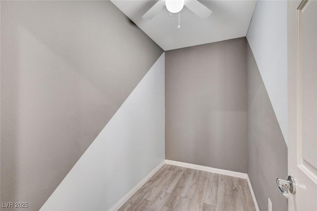 6402 Parrot Ridge Ct, Las Vegas, NV 89139 - stairway with wood finished floors, a ceiling fan, and baseboards