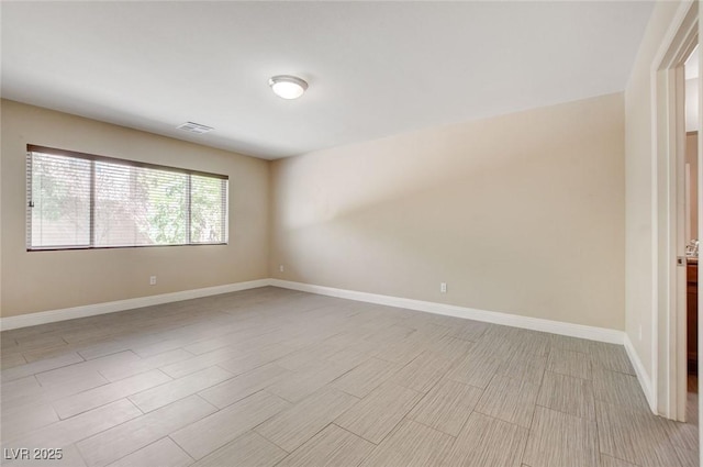 6402 Parrot Ridge Ct, Las Vegas, NV 89139 - unfurnished room with baseboards and light wood-type flooring