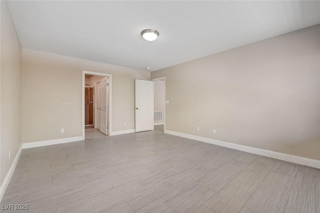6402 Parrot Ridge Ct, Las Vegas, NV 89139 - spare room featuring baseboards and light wood finished floors