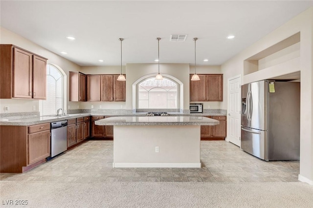 6402 Parrot Ridge Ct, Las Vegas, NV 89139 - kitchen featuring stainless steel appliances, light countertops, recessed lighting, a sink, and pendant lighting